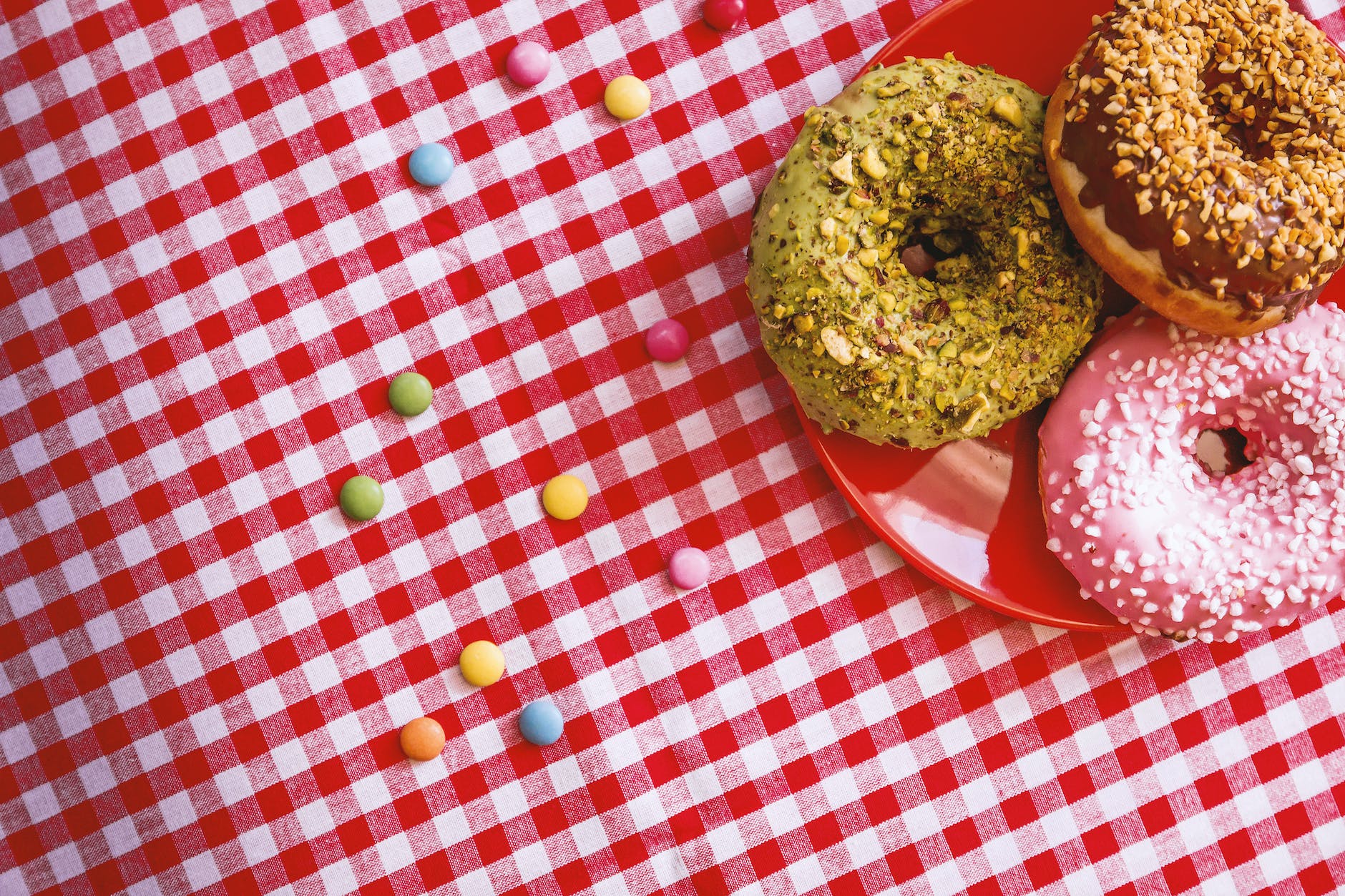 three donuts on plate